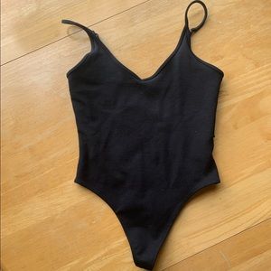 Black thong bodysuit by Sunday Best from Aritzia
